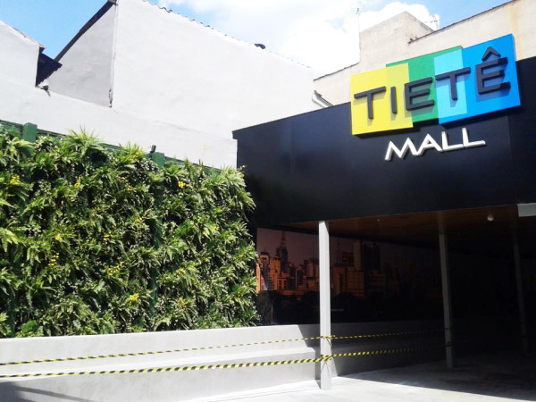 <span>Tietê Mall</span><i>→</i>